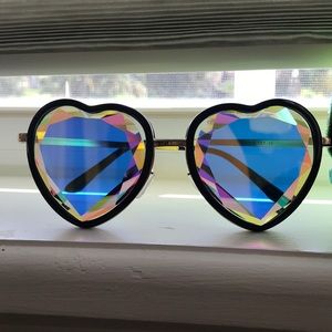 h0les heart-shaped kaleidoscope sunglasses.